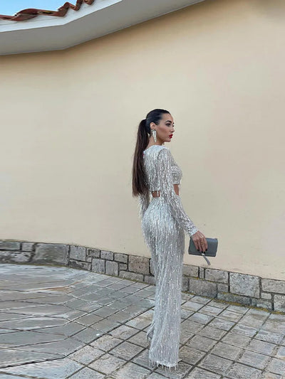 Glinsterende avondset met cropped top en lange mouwen broek voor een opvallende look