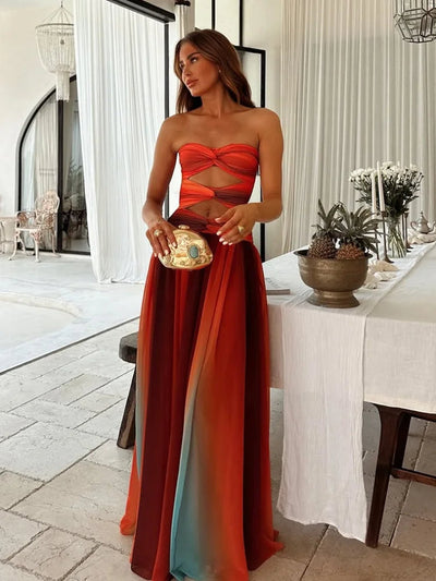 Elegante mouwloze maxi jurk met verloop en uitgesneden details