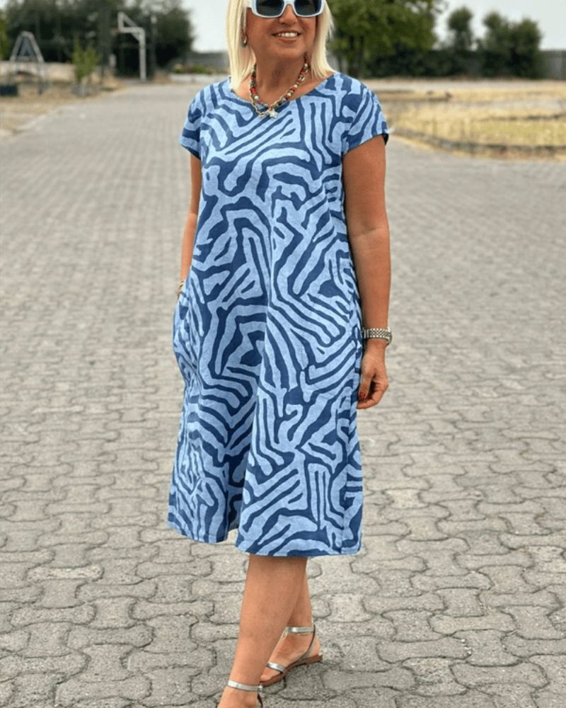 Zomerse jurk met ronde hals en sierlijke print
