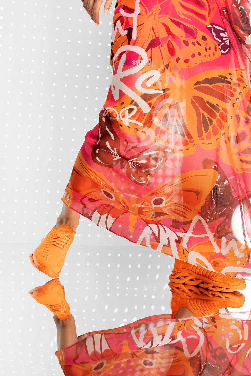 Lange damesjurk met print en halterstijl voor zomerse gelegenheden