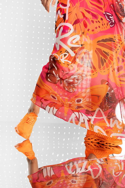 Lange damesjurk met print en halterstijl voor zomerse gelegenheden