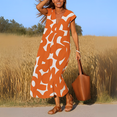 Elegante maxi jurk met korte mouwen en geometrisch patroon