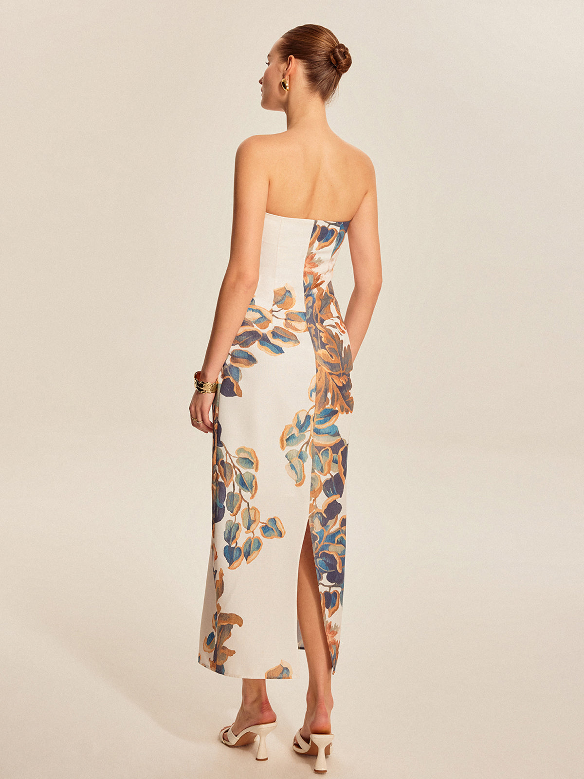 Elegante strapless jurk met bloemenmotief en verfijnde uitstraling