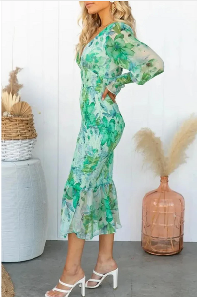 Elegante midi jurk met lange mouwen en bloemenprint
