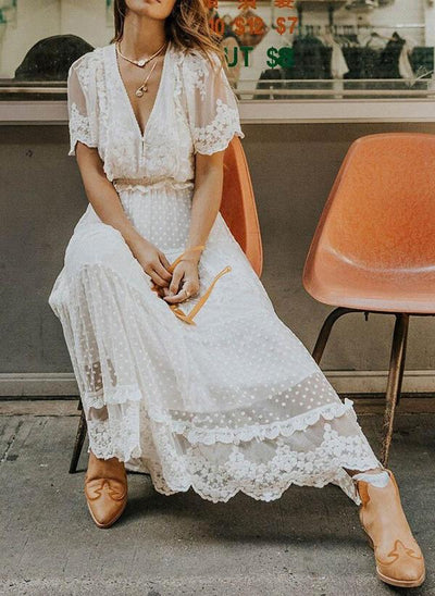 Bohemian maxi jurk met geborduurde details in elegante stijl