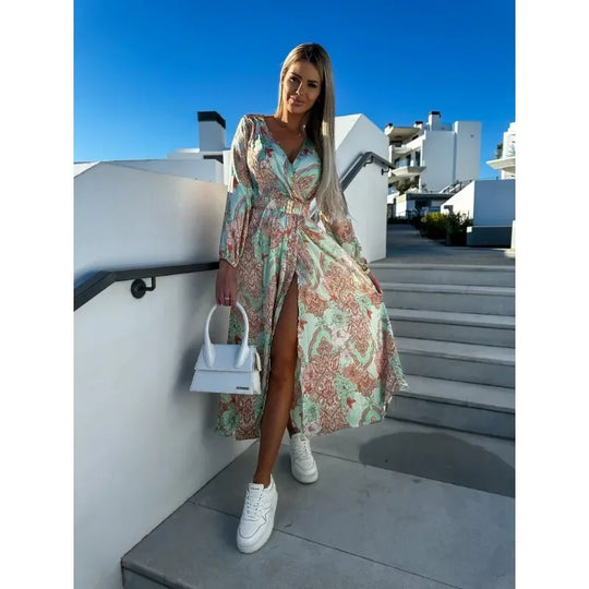 Midi damesjurk met print en elegante halslijn en lange mouwen