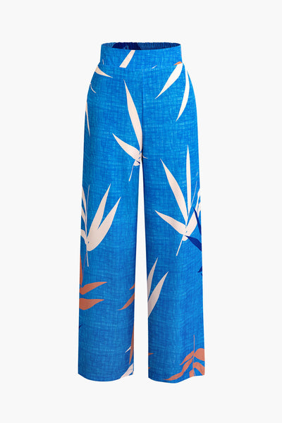 Tweedelige set met cropped top met strikbandjes en wijde broek met bamboebladerenprint