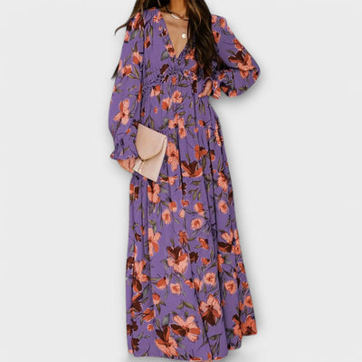 Elegante lange damesjurk met bloemenmotief en lange mouwen voor een luchtige stijl
