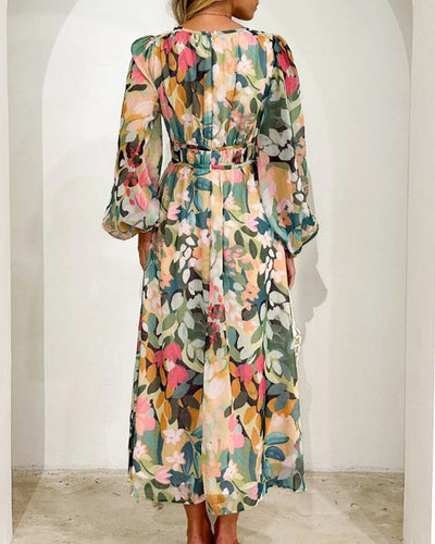 Elegante lange jurk met bloemenprint en ballonmouwen