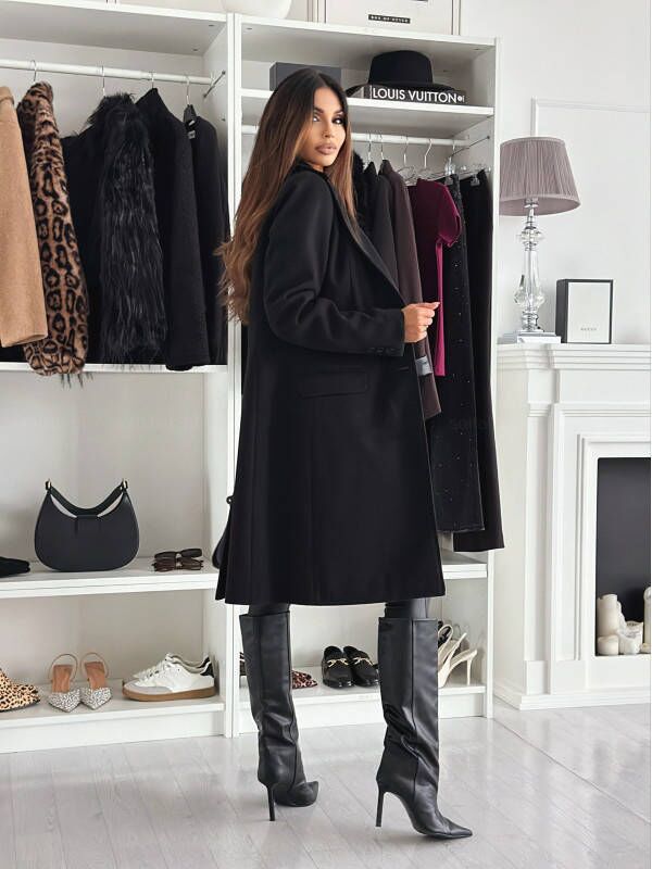 Lange elegante damesjas met knoopsluiting