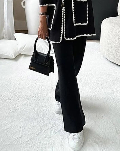 Brenda - Tweedelige set van casual broek en gebreide top versierd met effen gekleurde lijn