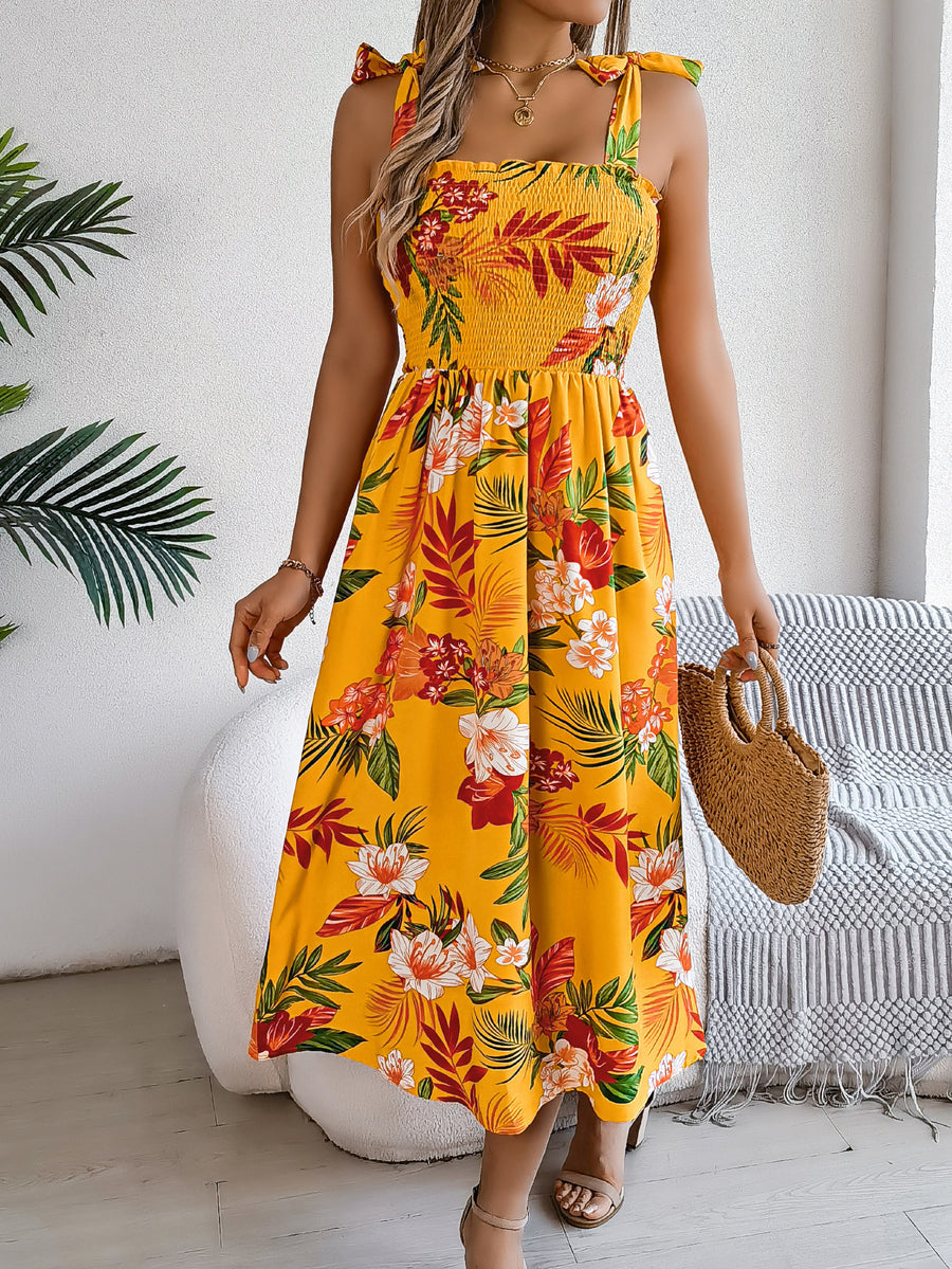 Zomerse lange jurk met bloemenprint en smalle bandjes voor een elegante look