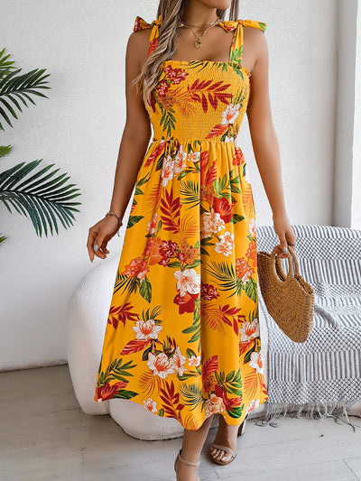 Zomerse lange jurk met bloemenprint en smalle bandjes voor een elegante look