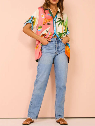 Tweedelige zomerset met wijde blouse en broek met strandprint