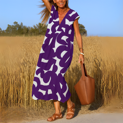 Elegante maxi jurk met korte mouwen en geometrisch patroon