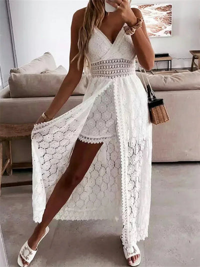 Korte zomer jumpsuit met fijne bandjes en vloeiende sleep