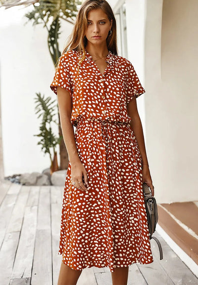 Stijlvolle dames midi jurk met korte mouwen voor zomerse dagen
