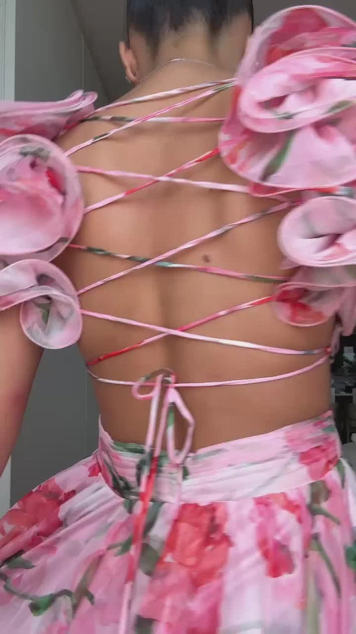 Lange damesjurk met bloemenprint plooidetail en sierlijke bandjes