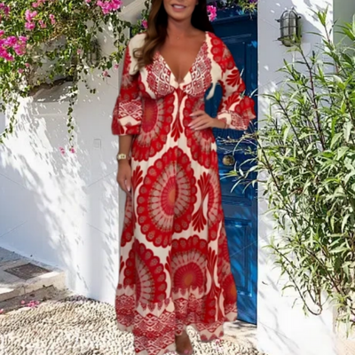 Lange bohemian damesjurk in retrostijl met diepe V-hals voor zomerse dagen