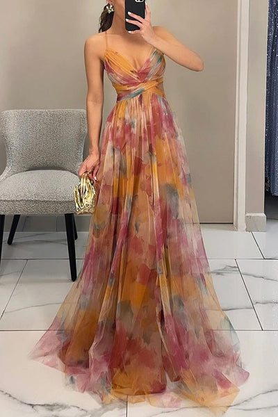 Elegante maxi jurk met dunne bandjes en artistiek bloemenmotief