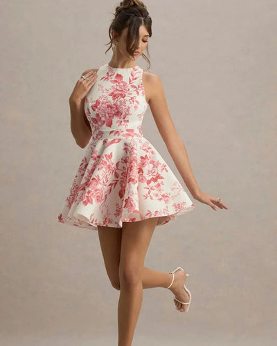 Elegante korte jurk met open rug en strikdetail achteraan
