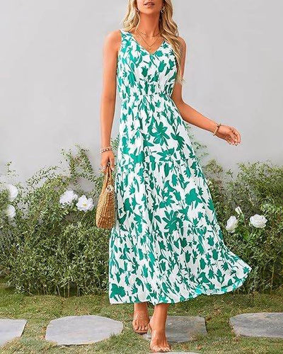 Elegante lange maxi jurk zonder mouwen met vloeiende uitstraling