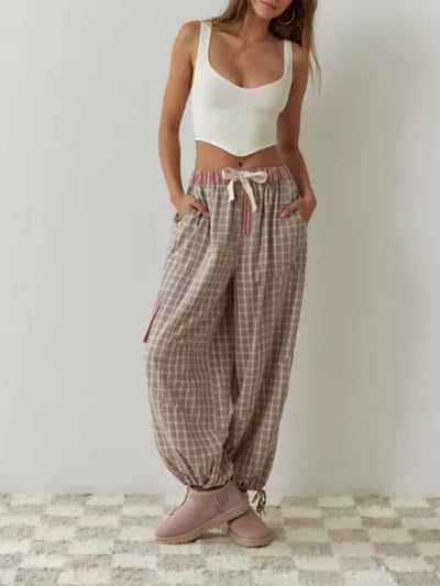 Los damespyjamaset met doorknoopshirt en wijde broek