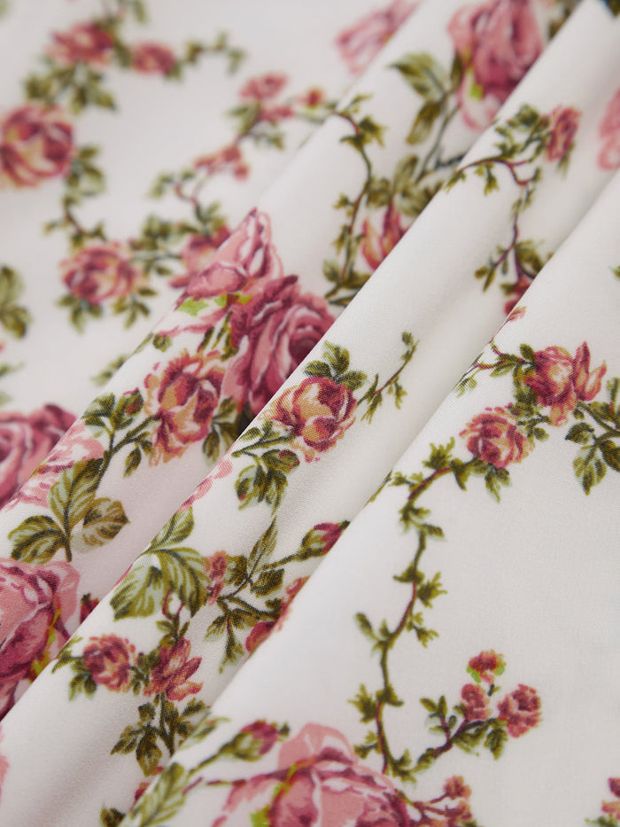 Zomerse midi jurk met bloemenpatroon en fijne schouderbandjes