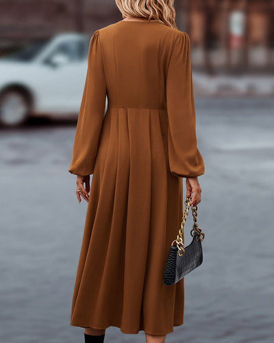 Elegante herfst midi-jurk met lange knoopsluiting mouwen