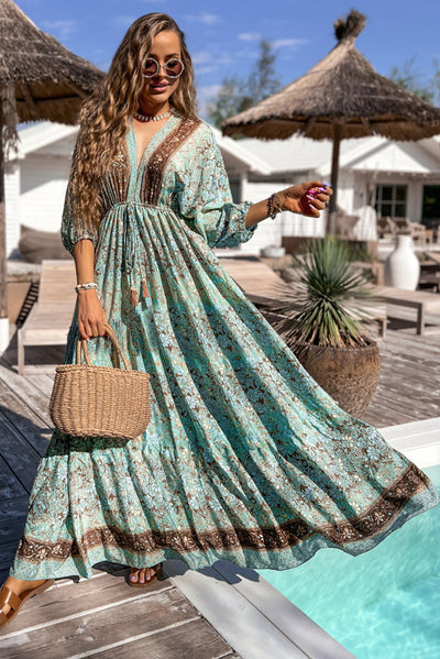Lange boho-jurk met bloemenprint, open rug en hoge taille