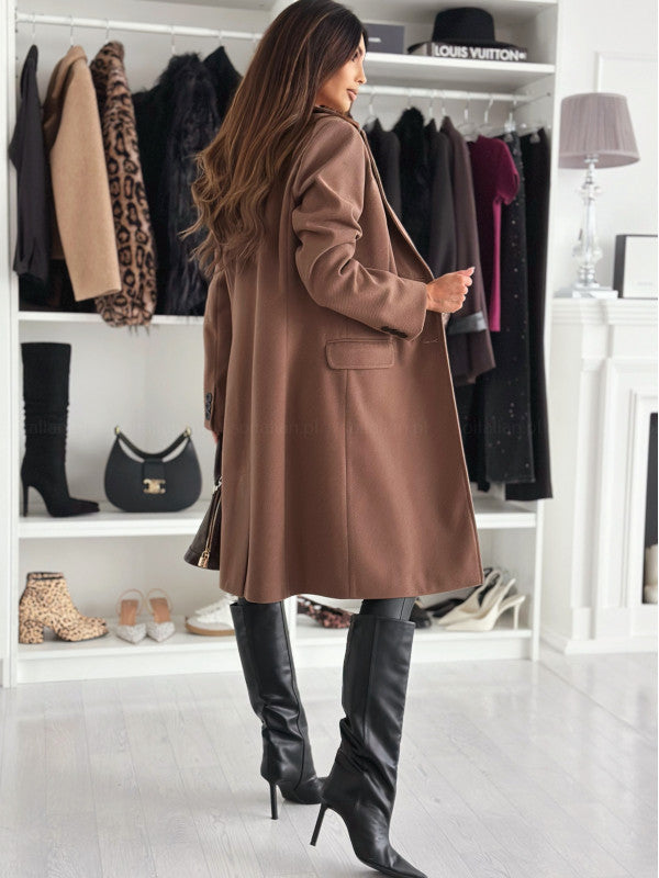 Lange elegante damesjas met knoopsluiting