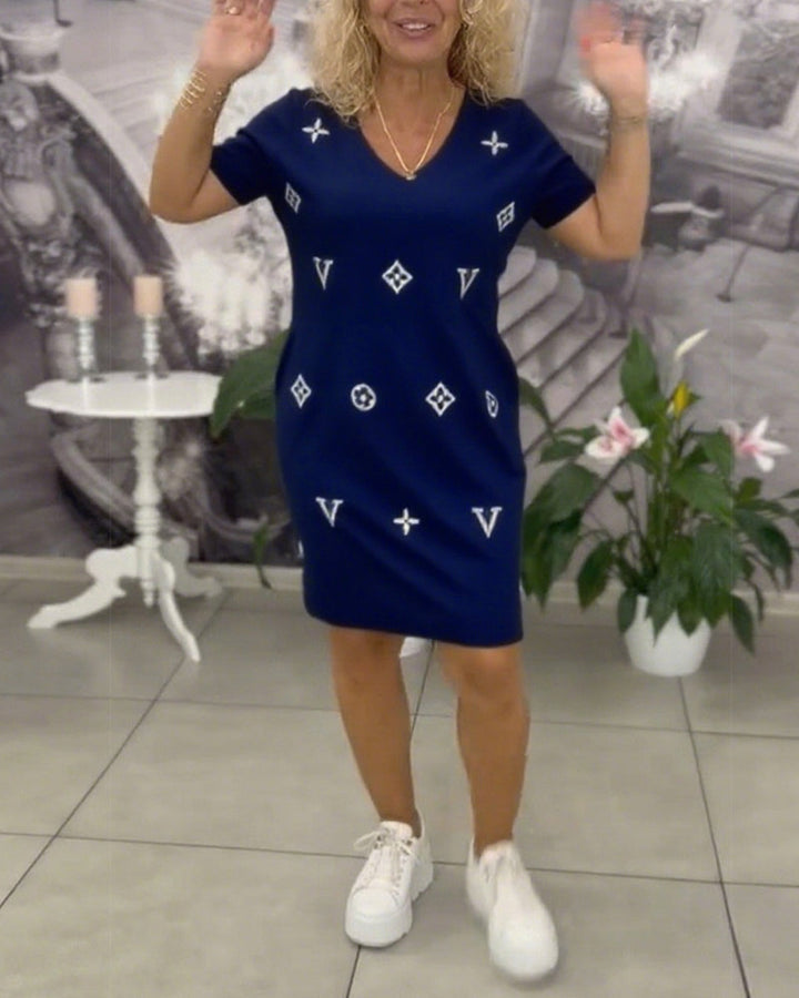 Damesjurk met korte mouwen en V-hals in moderne stijl