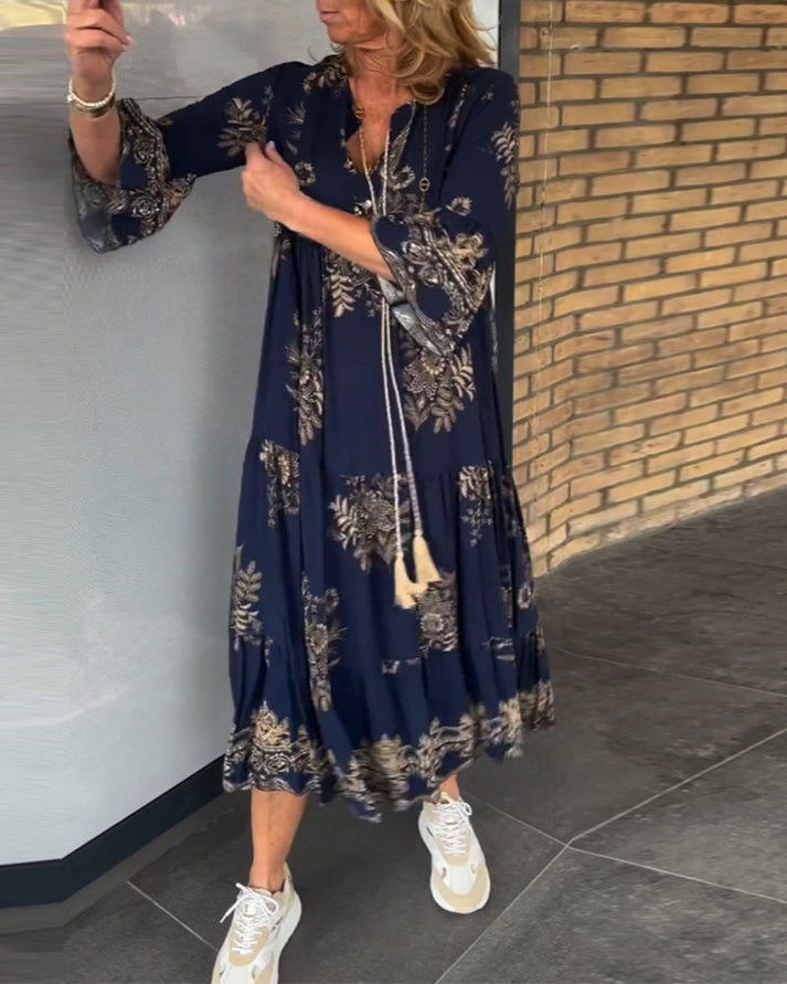Vintage dames maxi jurk met V-hals en losvallend silhouet
