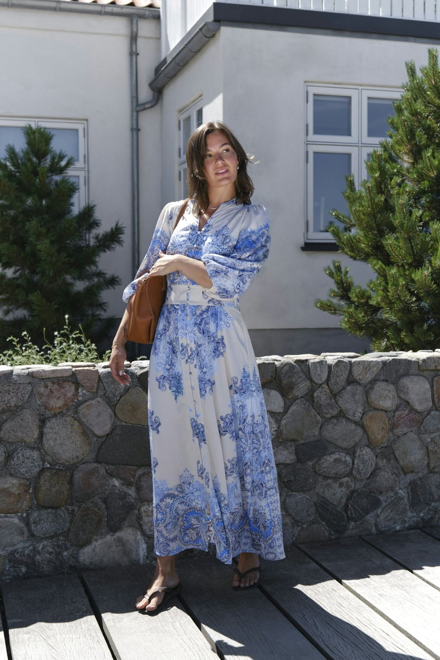 Elegante maxi jurk met knopen en driekwart mouwen
