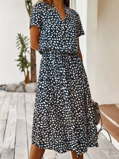 Stijlvolle dames midi jurk met korte mouwen voor zomerse dagen