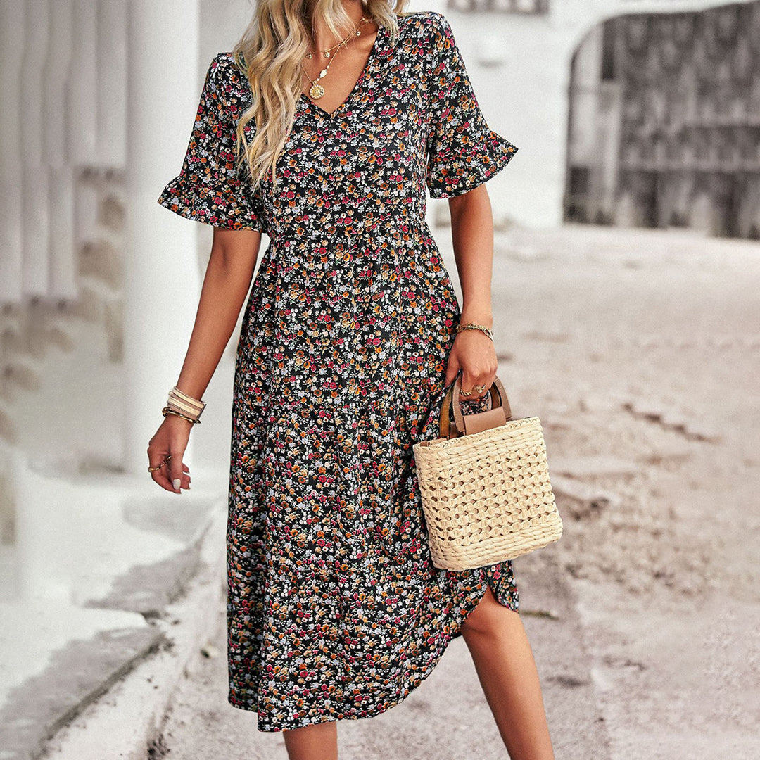 Midi jurk met bloemenprint en losvallend ontwerp