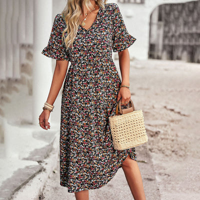 Midi jurk met bloemenprint en losvallend ontwerp