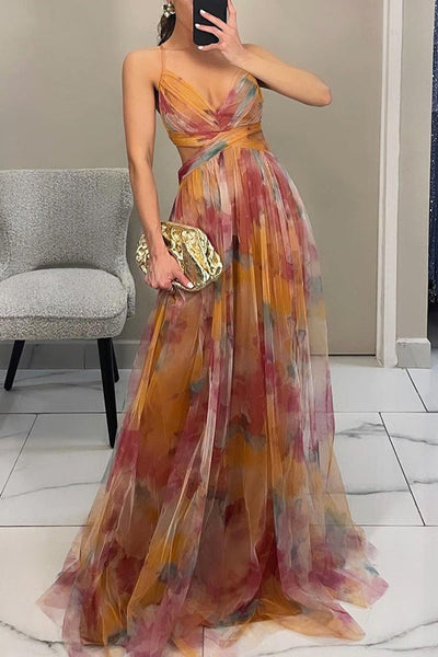 Elegante maxi jurk met dunne bandjes en artistiek bloemenmotief