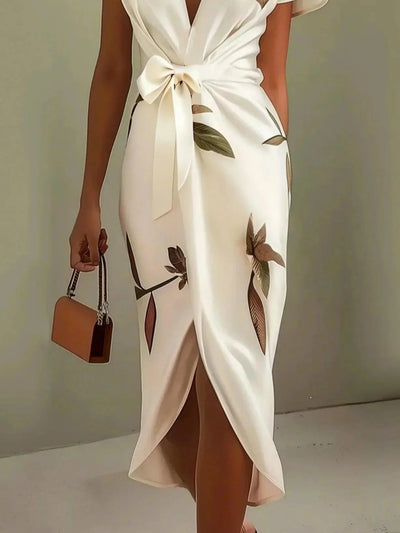 Elegante midi overslagjurk met bladprint v hals en korte mouwen