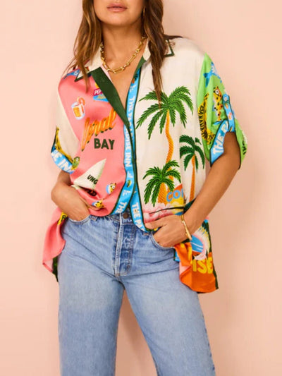 Tweedelige zomerset met wijde blouse en broek met strandprint