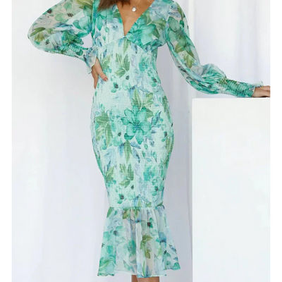 Elegante midi jurk met lange mouwen en bloemenprint