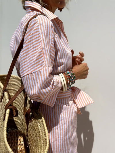 Dames midi zomerjurk met polokraag en stijlvolle strepen
