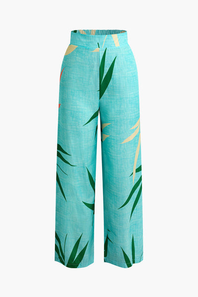 Tweedelige set met cropped top met strikbandjes en wijde broek met bamboebladerenprint