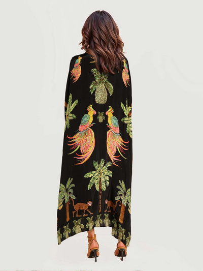 Lange maxi jurk met papegaaienprint voor een opvallende zomerse stijl