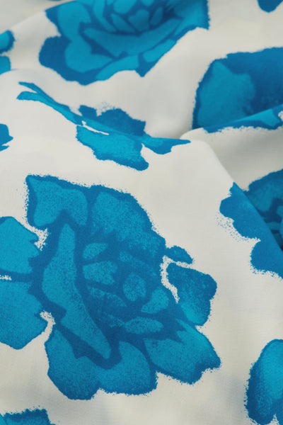 Nonchalant midi overslagjurk met ceintuur en korte wijde mouwen met print