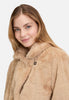 Stijlvolle korte jas in teddy stijl