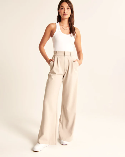 Maria - Getailleerde broek met wijde pijpen in beige