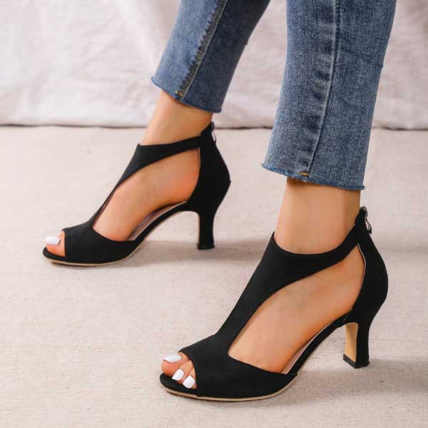Stijlvolle dames schoenen met lage hak en open teen perfect voor een elegante kijk
