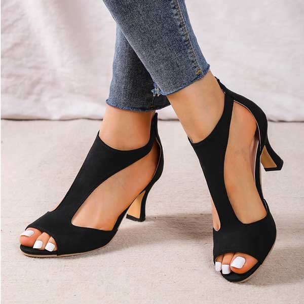 Stijlvolle dames schoenen met lage hak en open teen perfect voor een elegante kijk