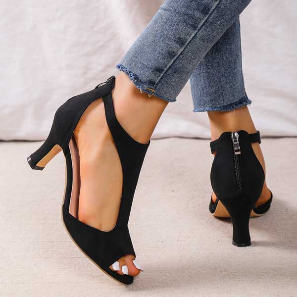 Stijlvolle dames schoenen met lage hak en open teen perfect voor een elegante kijk